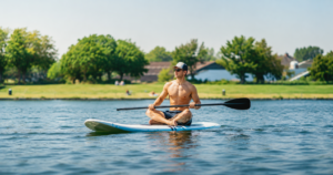 Person paddleboarding on Boyd Lake State Park near Loveland RV Resort.